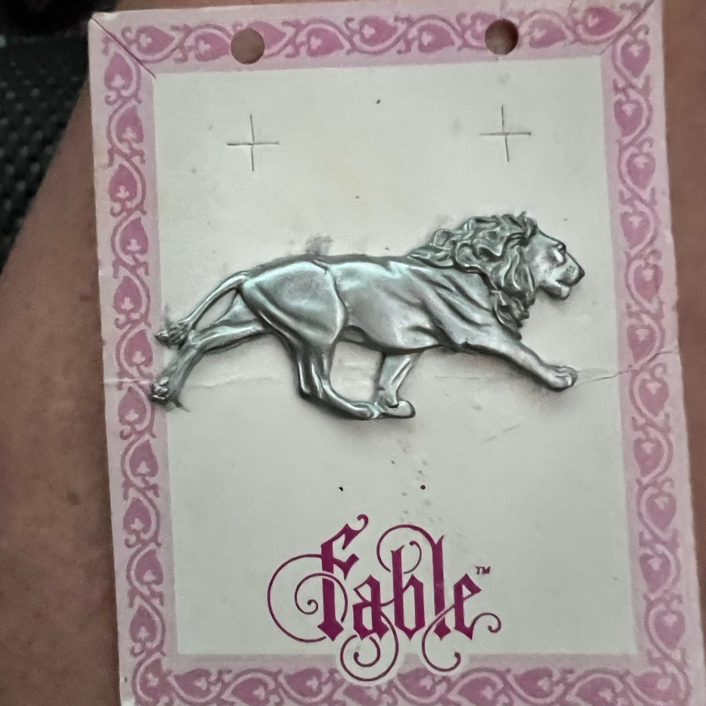 2 inch long fable lion pin antique beautiful